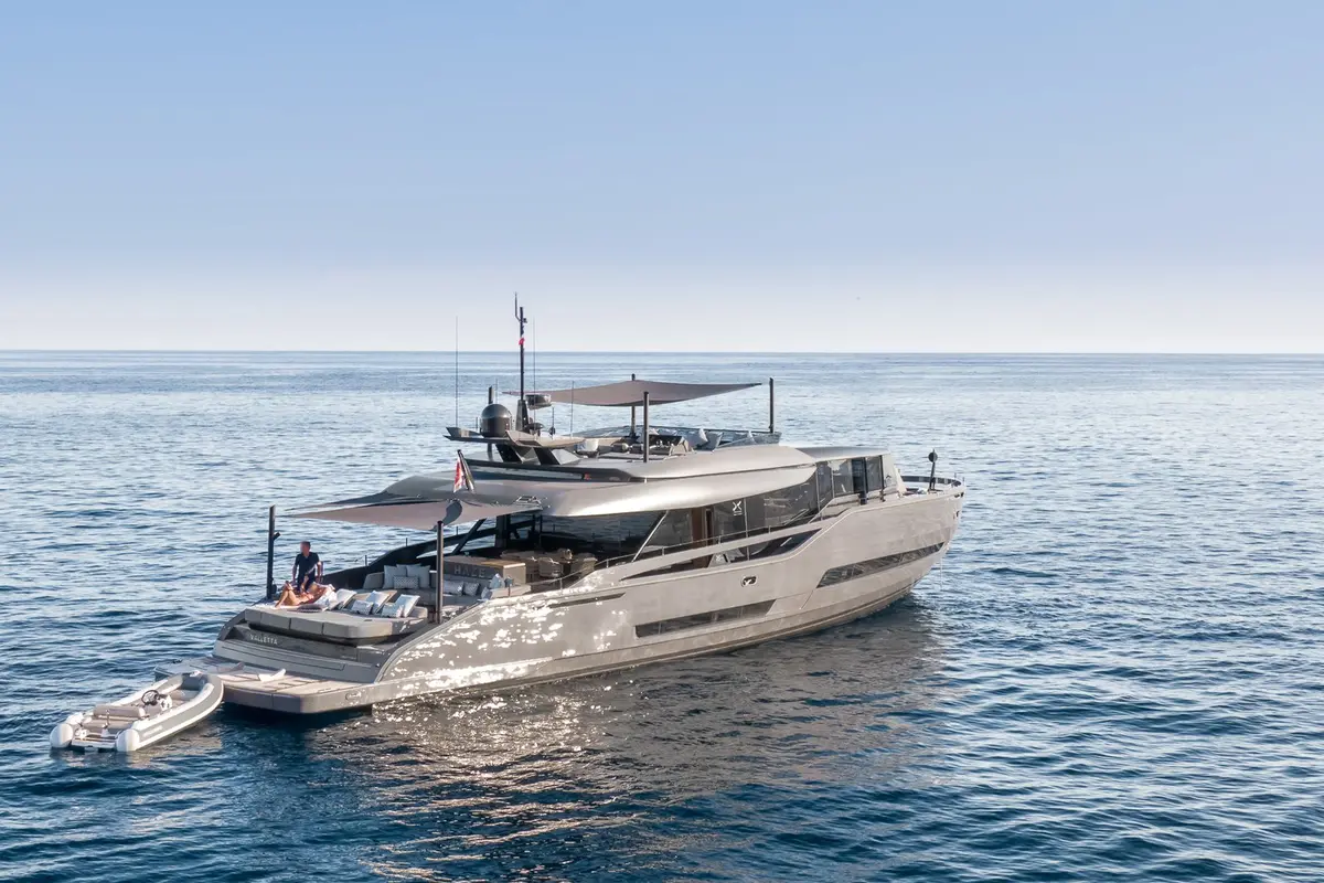 Extra 86, aft deck — Menorca Yacht Rental, Menorca. Fold-out terraces for slow lunches on open water